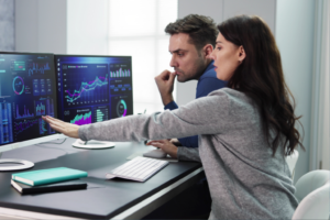 Marketers analysing Salesforce Marketing Cloud dashboards to turn data into decision-ready insights